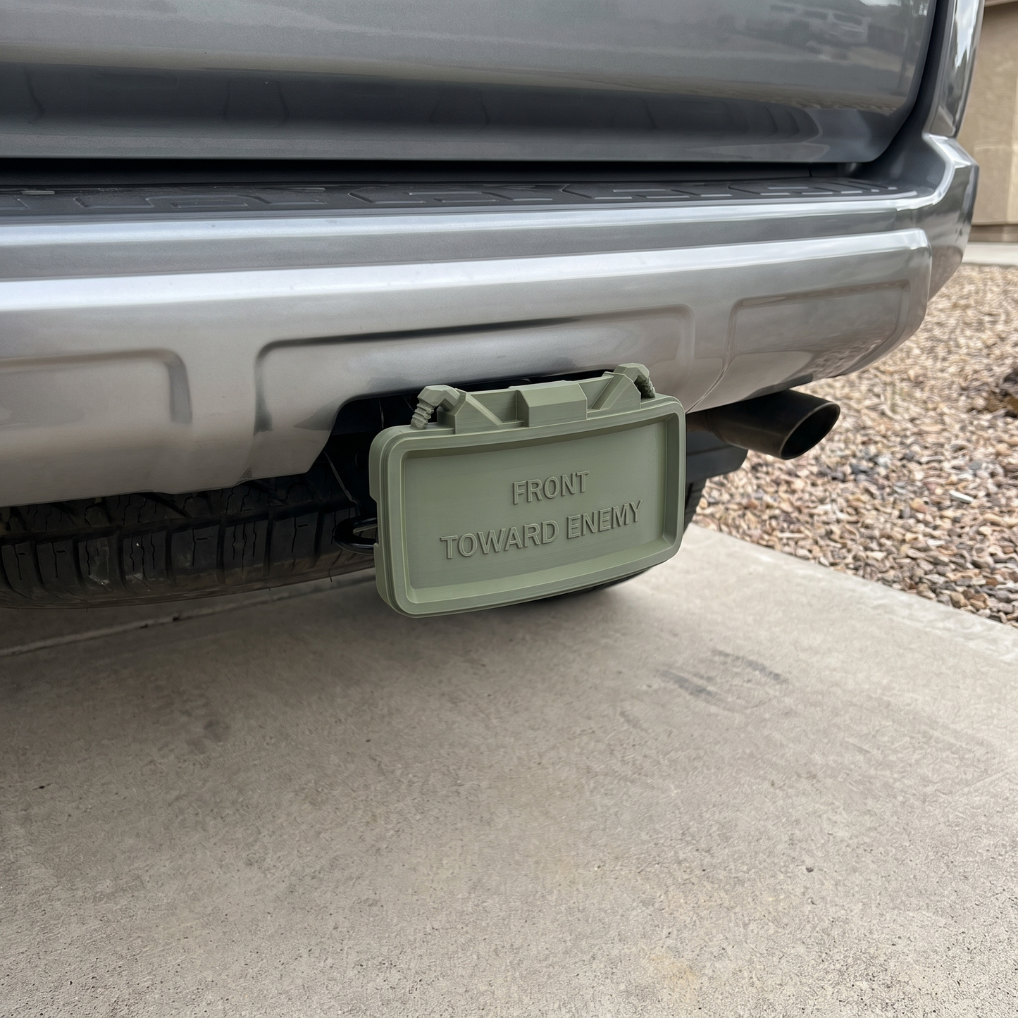 Claymore Hitch Cover — "Front Toward Enemy" Hitch Cover